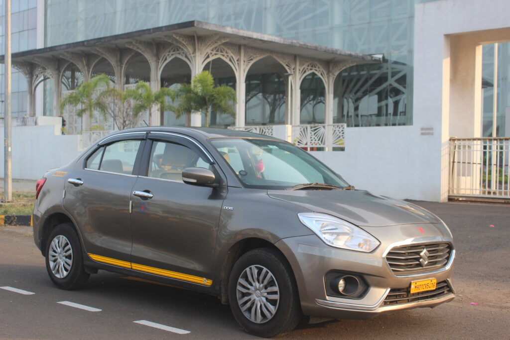 Sedan car rental in Aurangabad for daily travel city rides and business trips with AC service